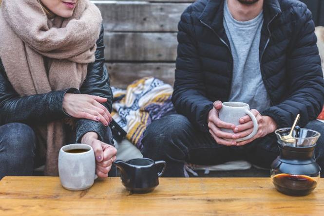 two people having a coffee together